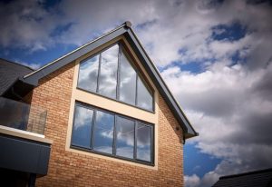 exterior shot of large glazed window on house