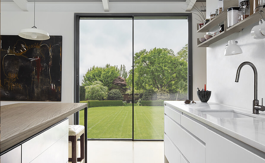 Cortizo COR Vision Sliding Patio Doors offering garden views with slim frames and expansive glass.